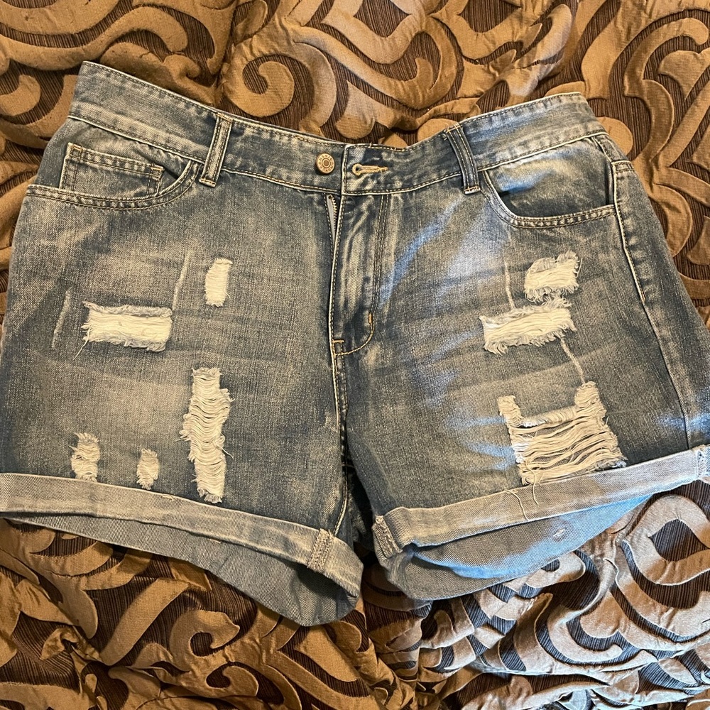 Jean shorts size large. Took tag off but never worn.